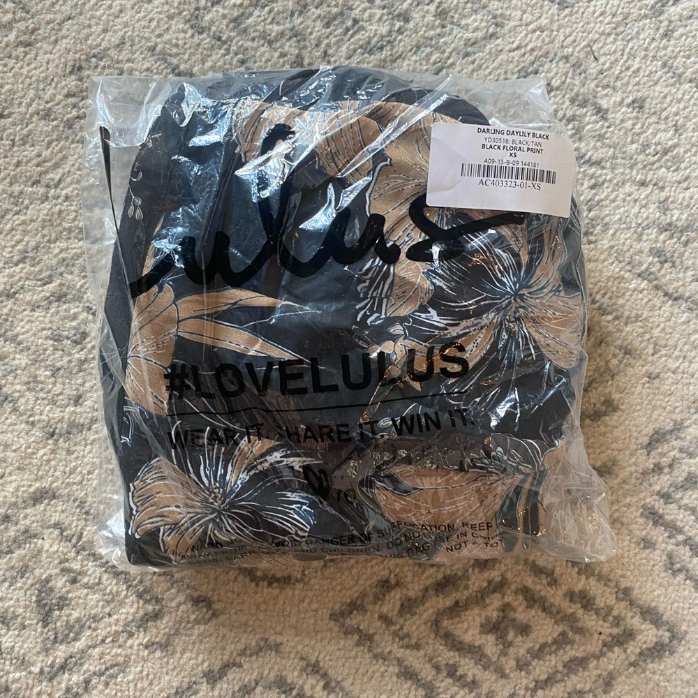 Never been worn black and tan high low maxi floral dress from Lulus.